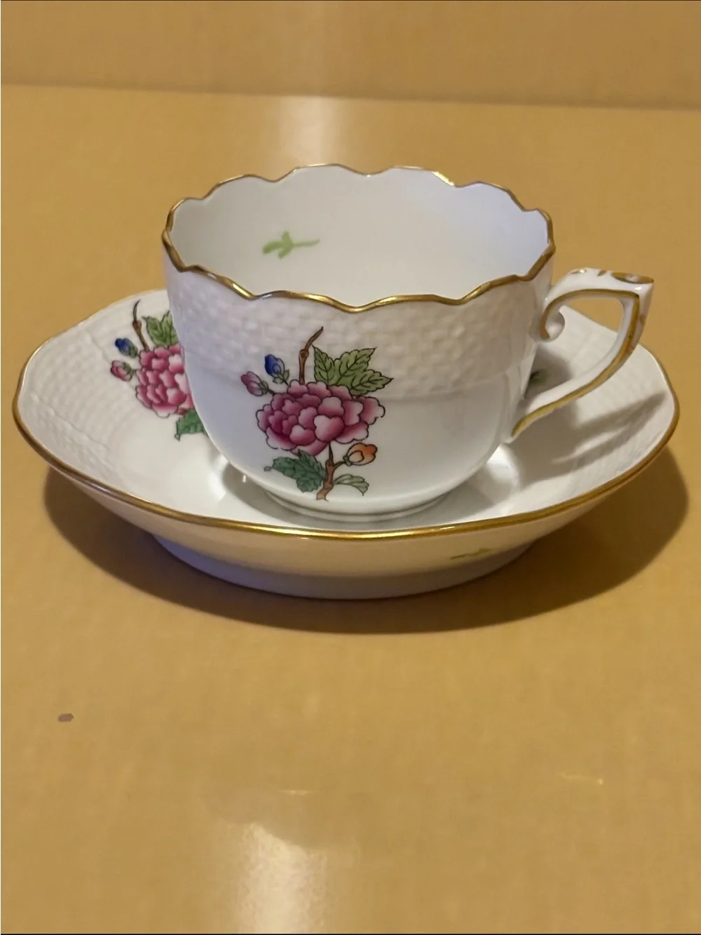 HEREND ETON SMALL PORCELAIN CUP AND SAUCER.